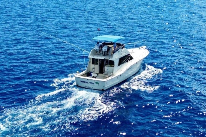 a small boat in a large body of water
