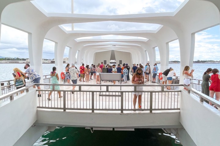 a room filled with furniture and a large window