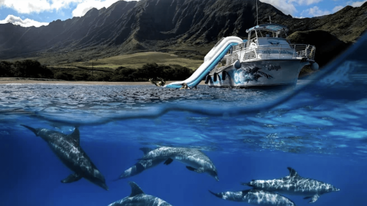 a body of water with a mountain in the background