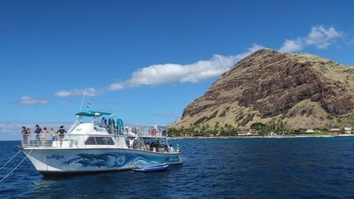 a small boat in a large body of water