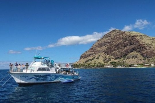 a small boat in a large body of water