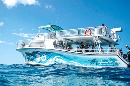 a small boat in a large body of water