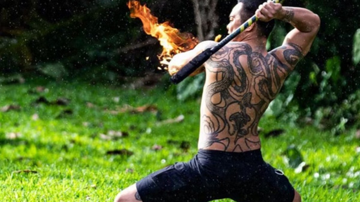 a man holding a frisbee