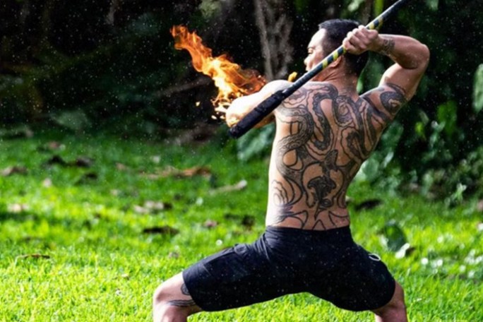 a man holding a frisbee