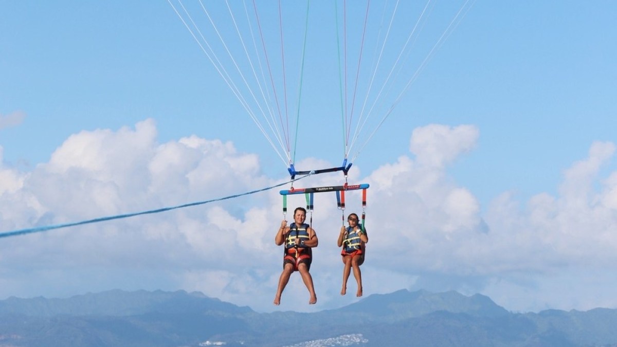 a parachute with a body of water
