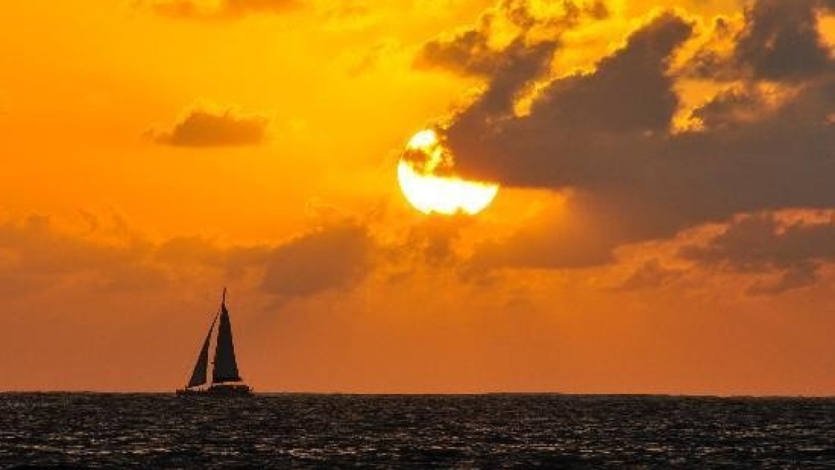 a sunset over a body of water