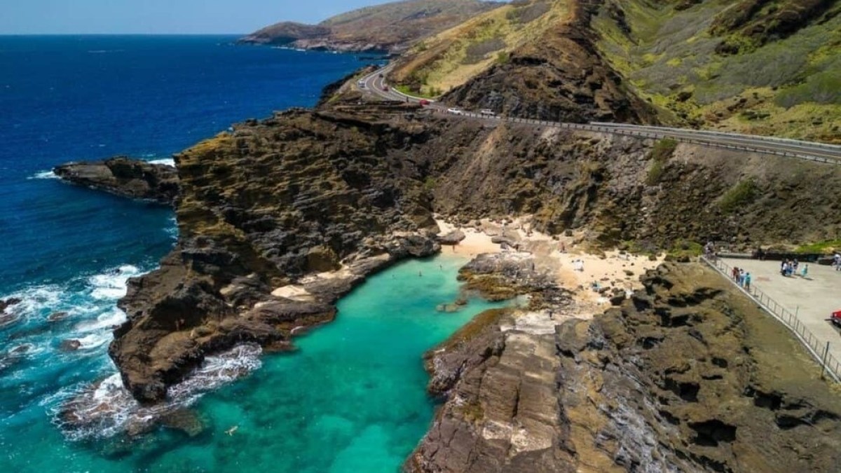 a rocky beach next to the ocean