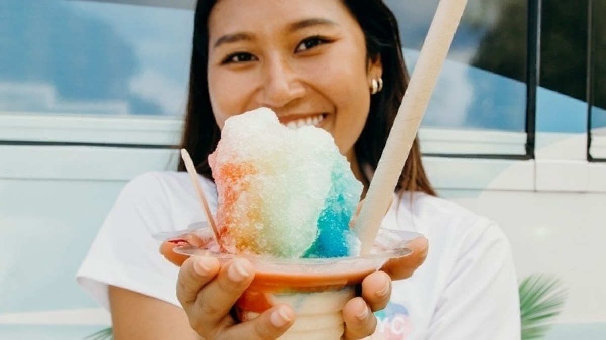 a person eating a sandwich