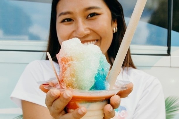 a person eating a sandwich