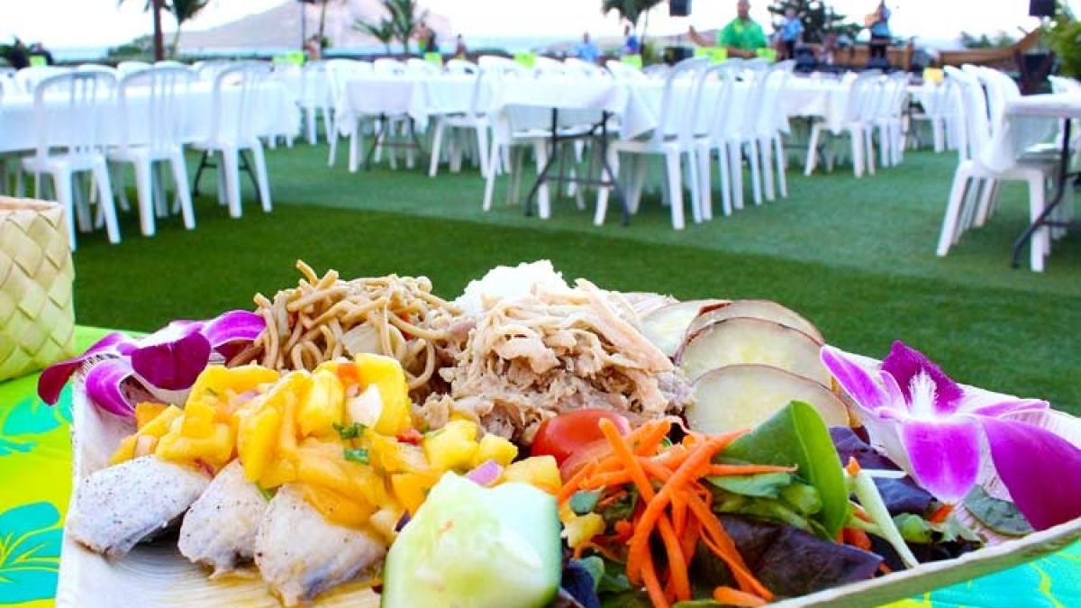 a plate of food on a picnic table