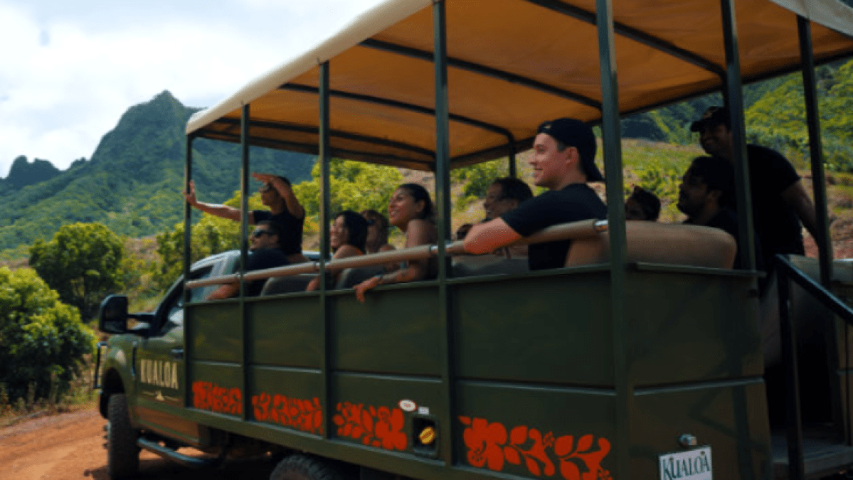 a person riding on the back of a truck