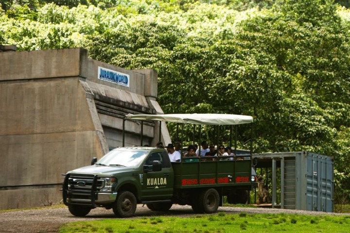 a truck is parked in front of a building
