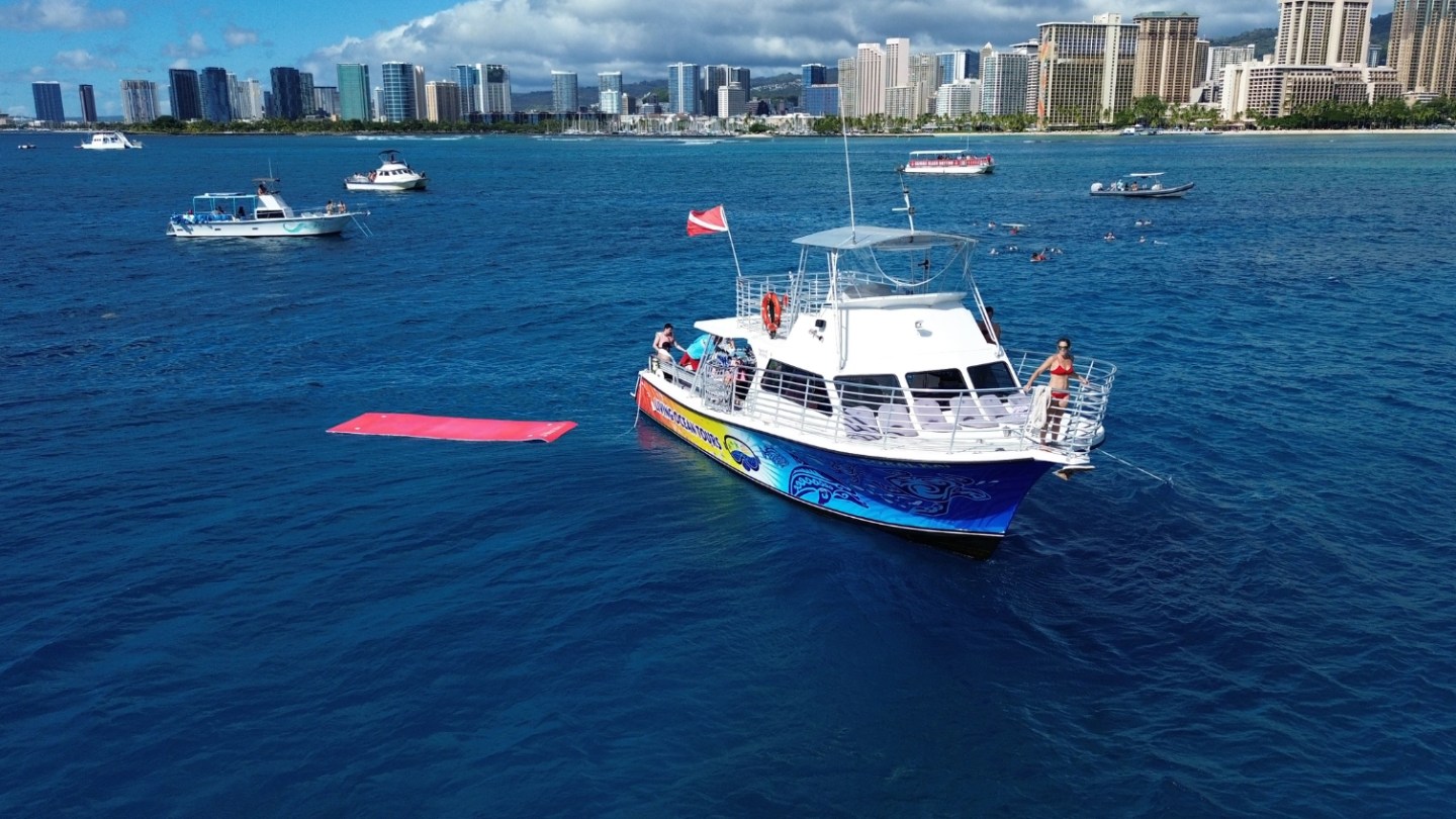 a small boat in a large body of water
