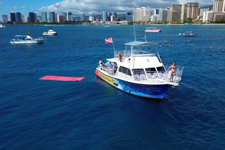 a small boat in a large body of water