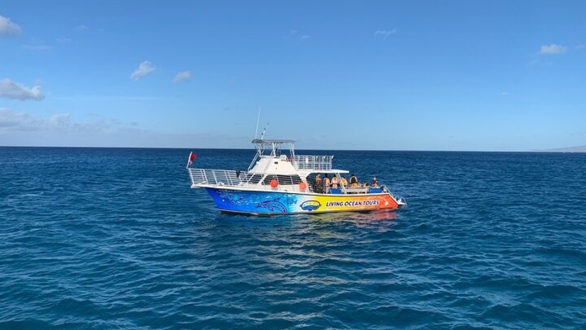 a small boat in a large body of water