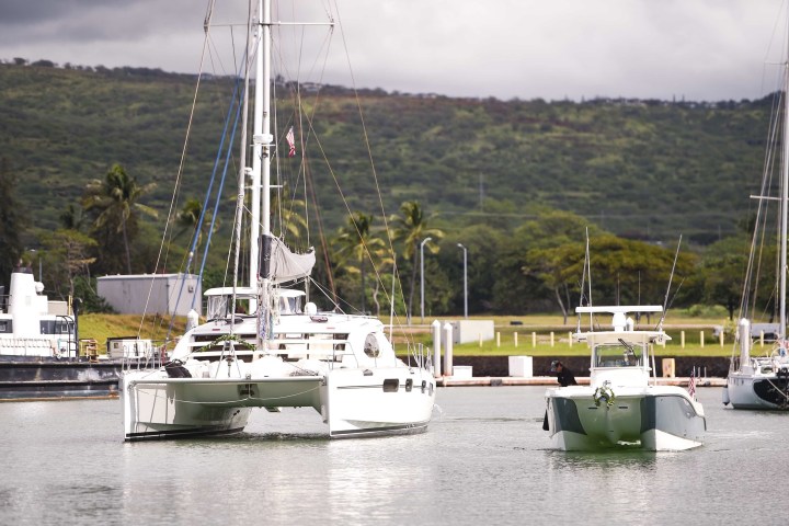 a small boat in a large body of water