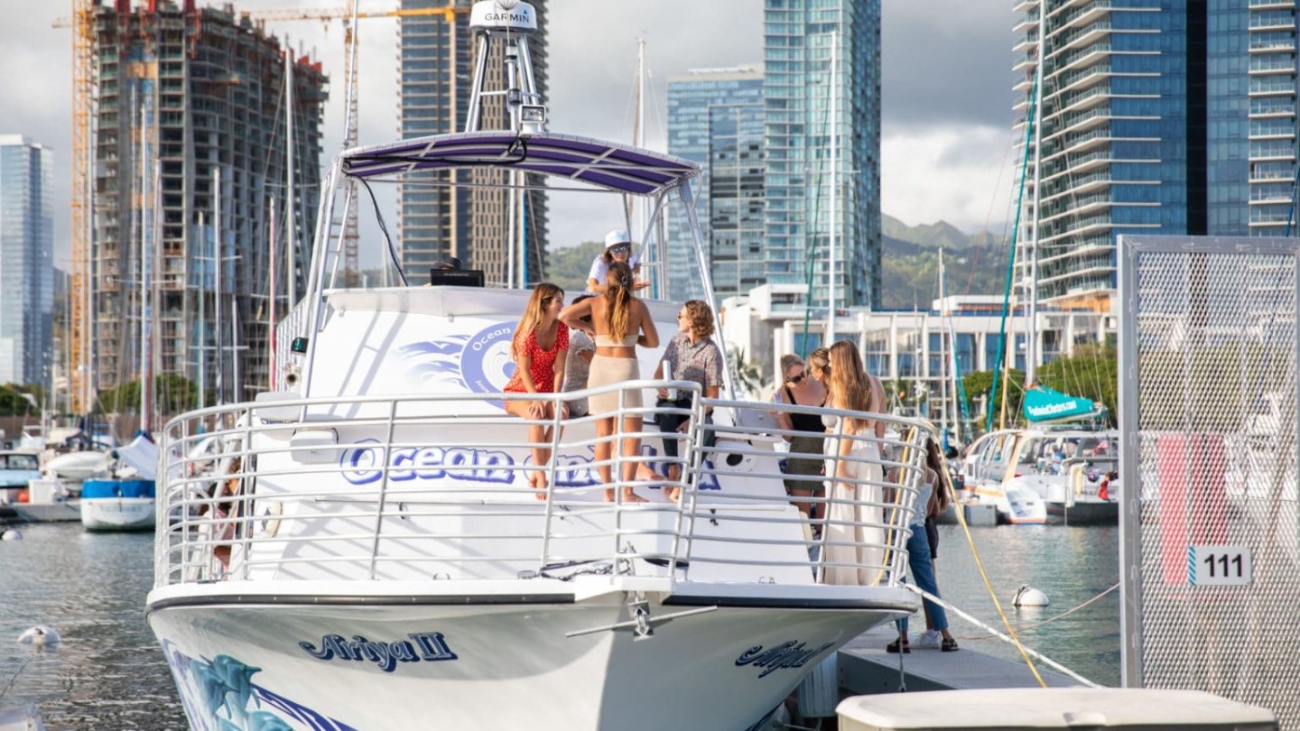 a boat is docked in a city