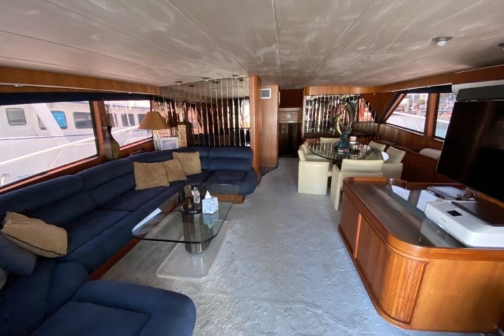 a room filled with furniture and a large window