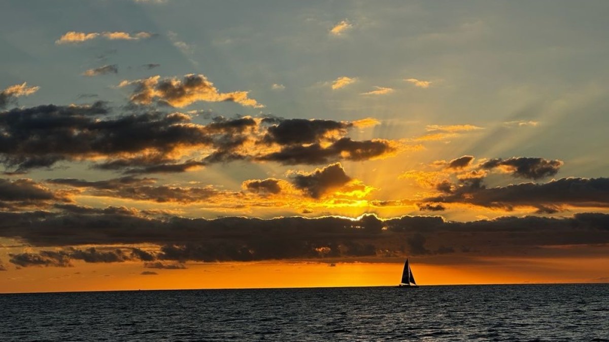 a sunset over a body of water