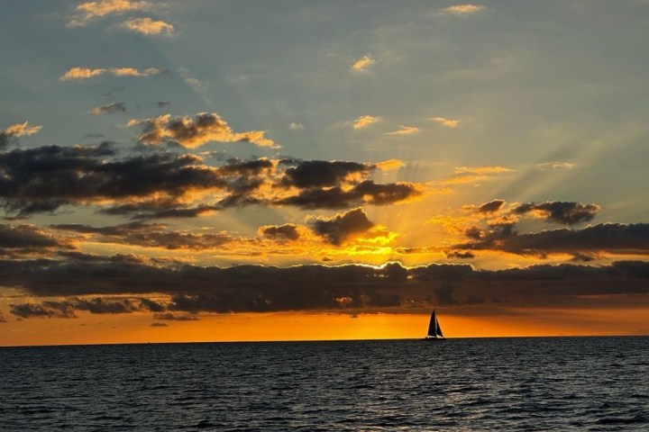 a sunset over a body of water