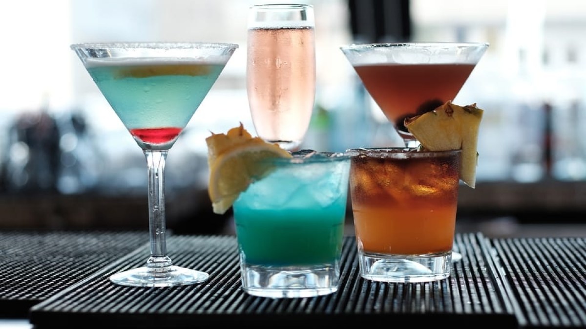 a close up of a wine glass sitting on a table