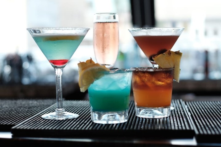 a close up of a wine glass sitting on a table