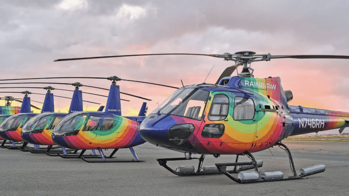 a small plane sitting on top of a helicopter