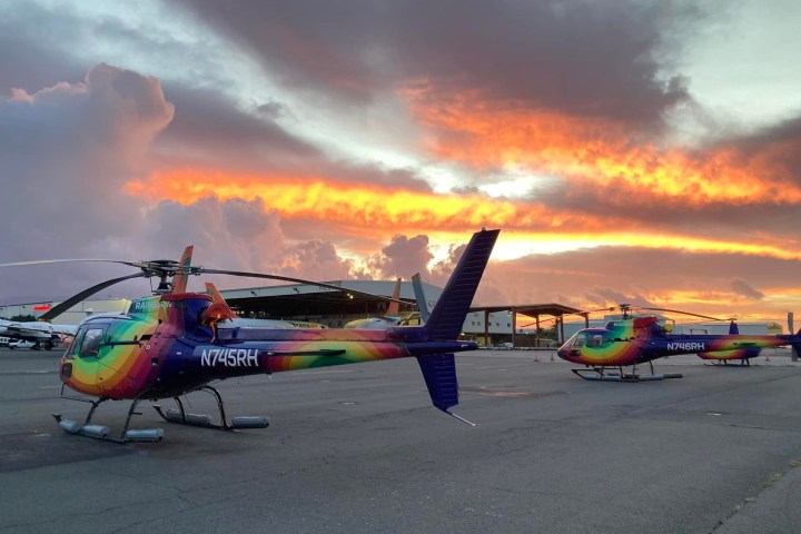 a small airplane is parked on the side of a road