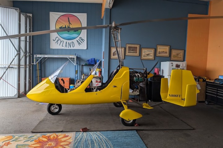 a airplane that is parked on the side of a building