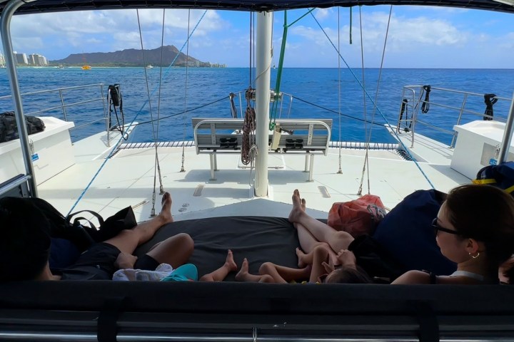 a couple of people that are sitting on a boat