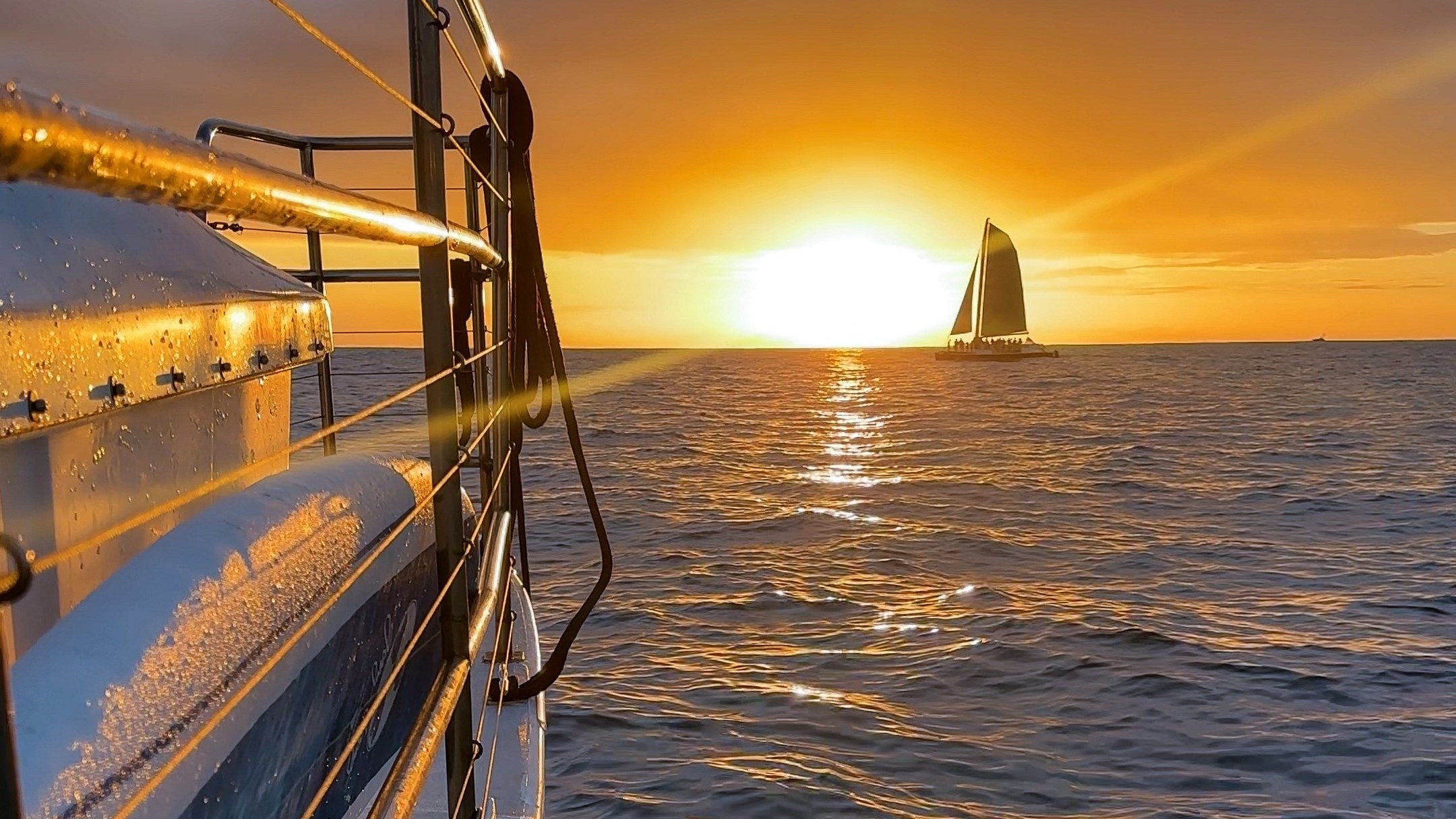 a sunset over a body of water