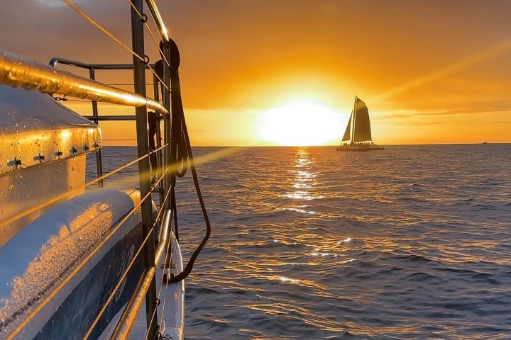 a sunset over a body of water