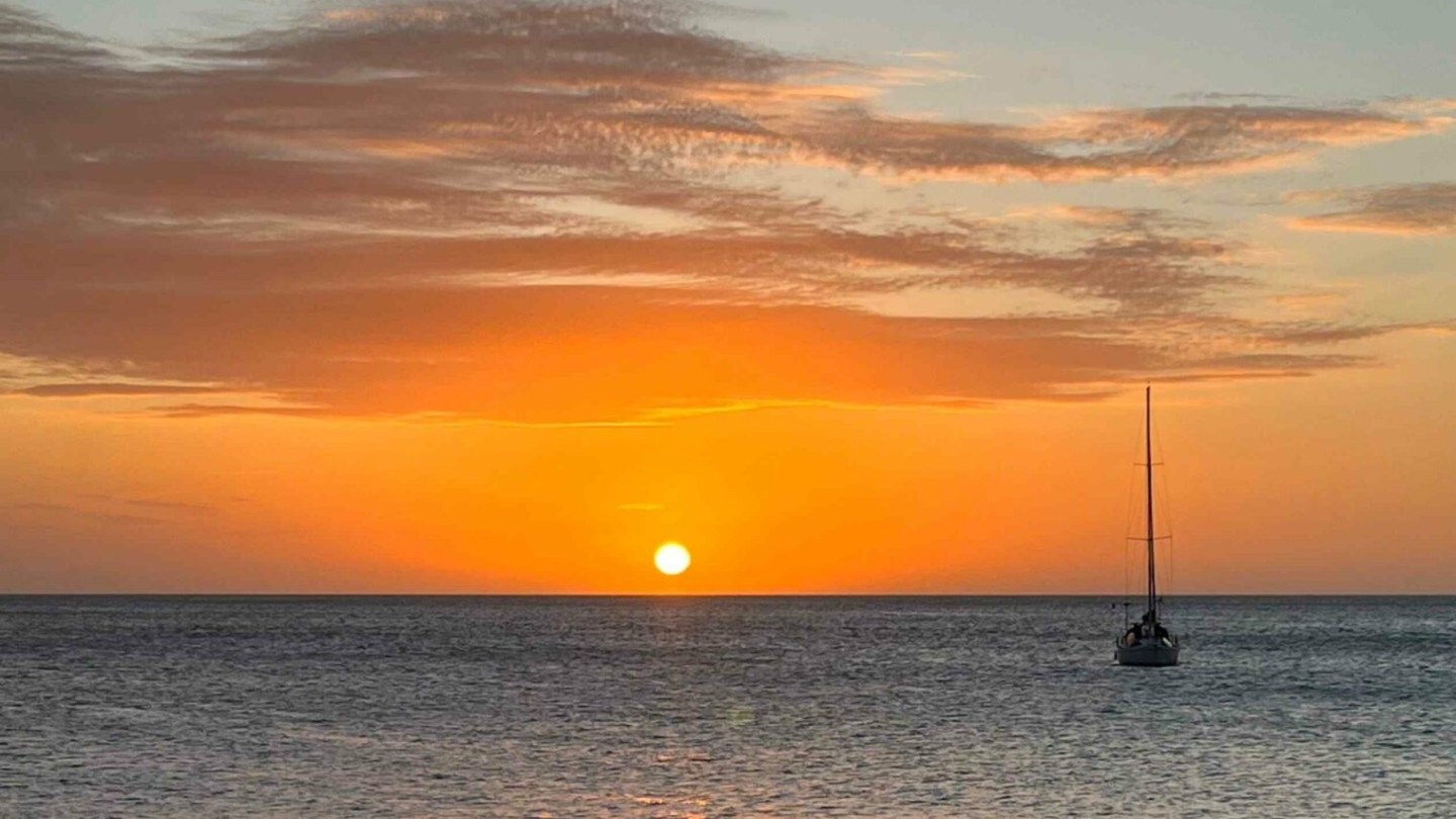 a sunset over a body of water