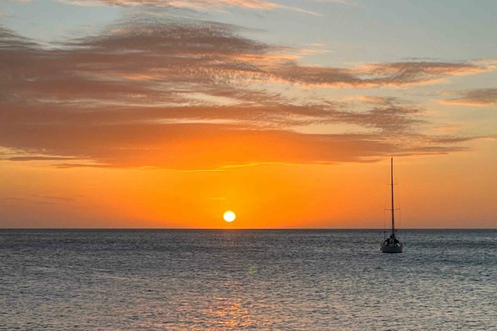 a sunset over a body of water