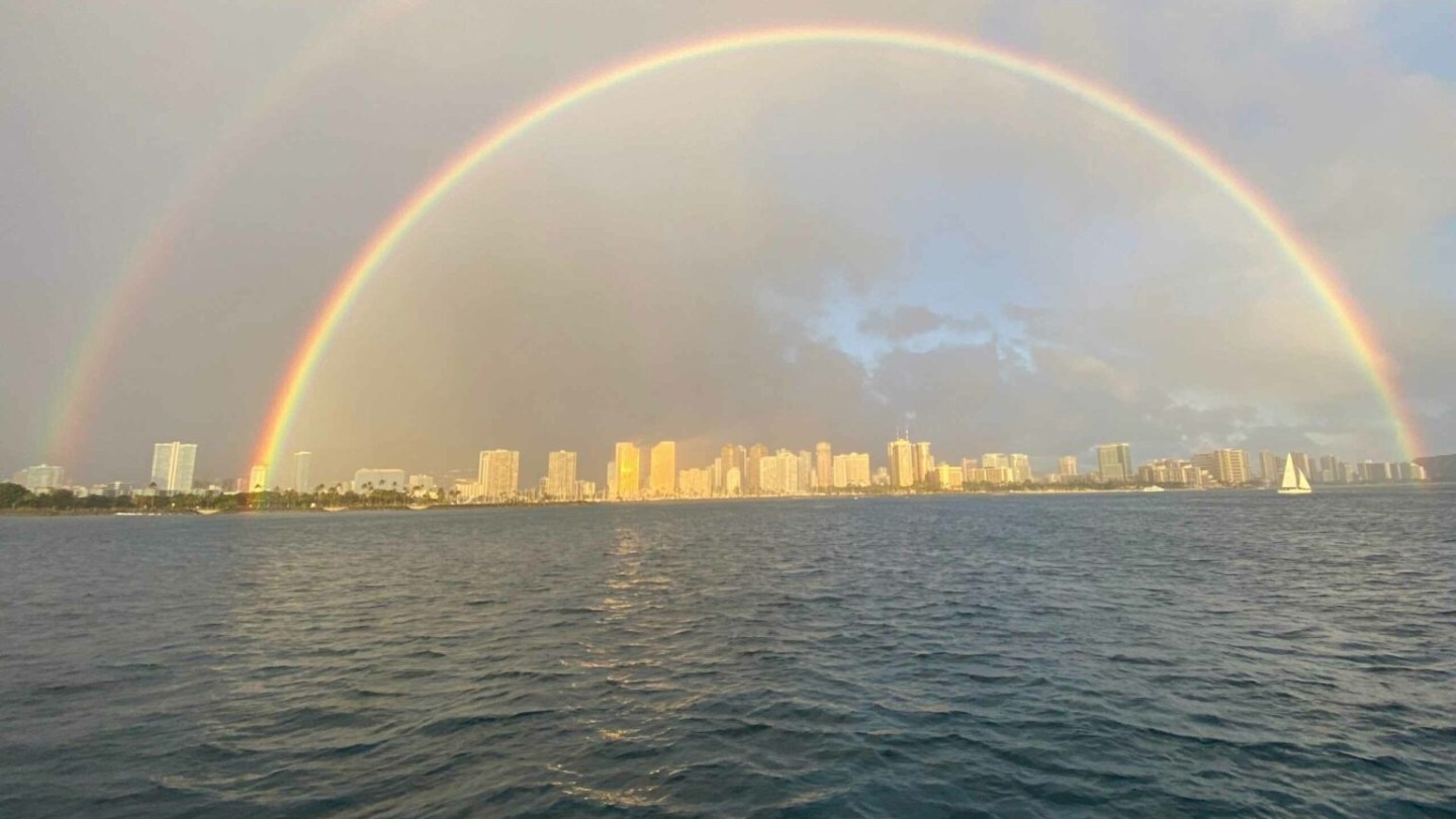 a rainbow over a body of water