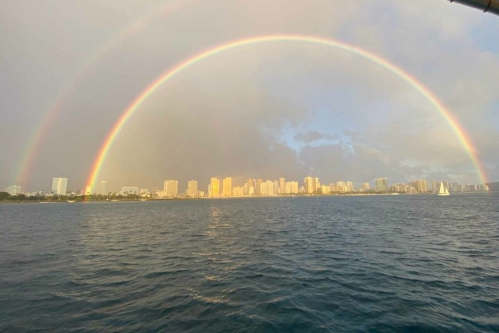 a rainbow over a body of water