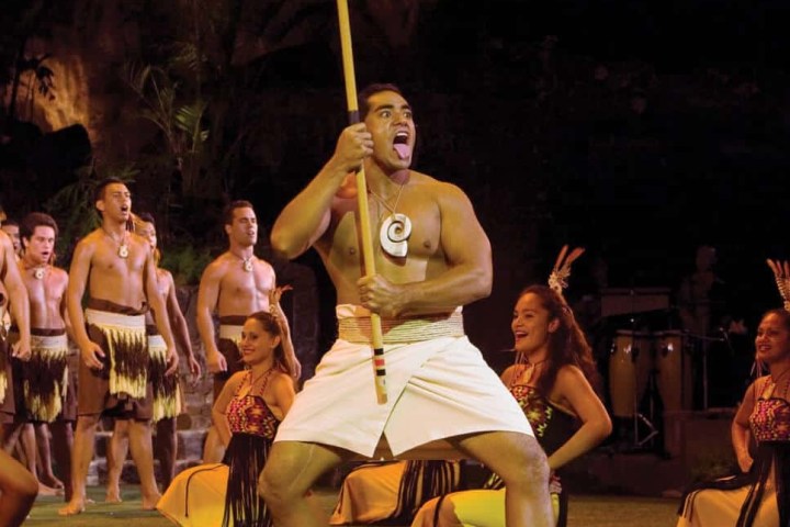 a group of people standing in front of a crowd