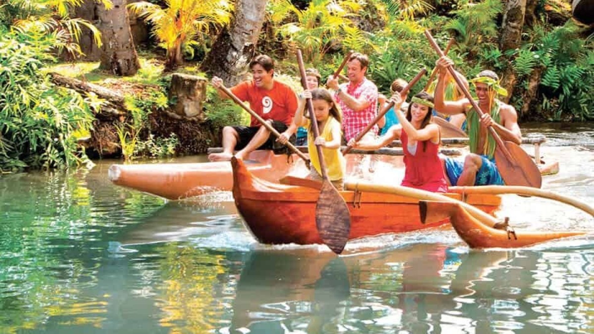 a group of people on a boat in the water